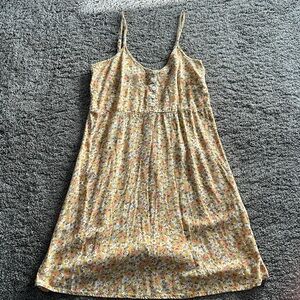 Small yellow floral dress.